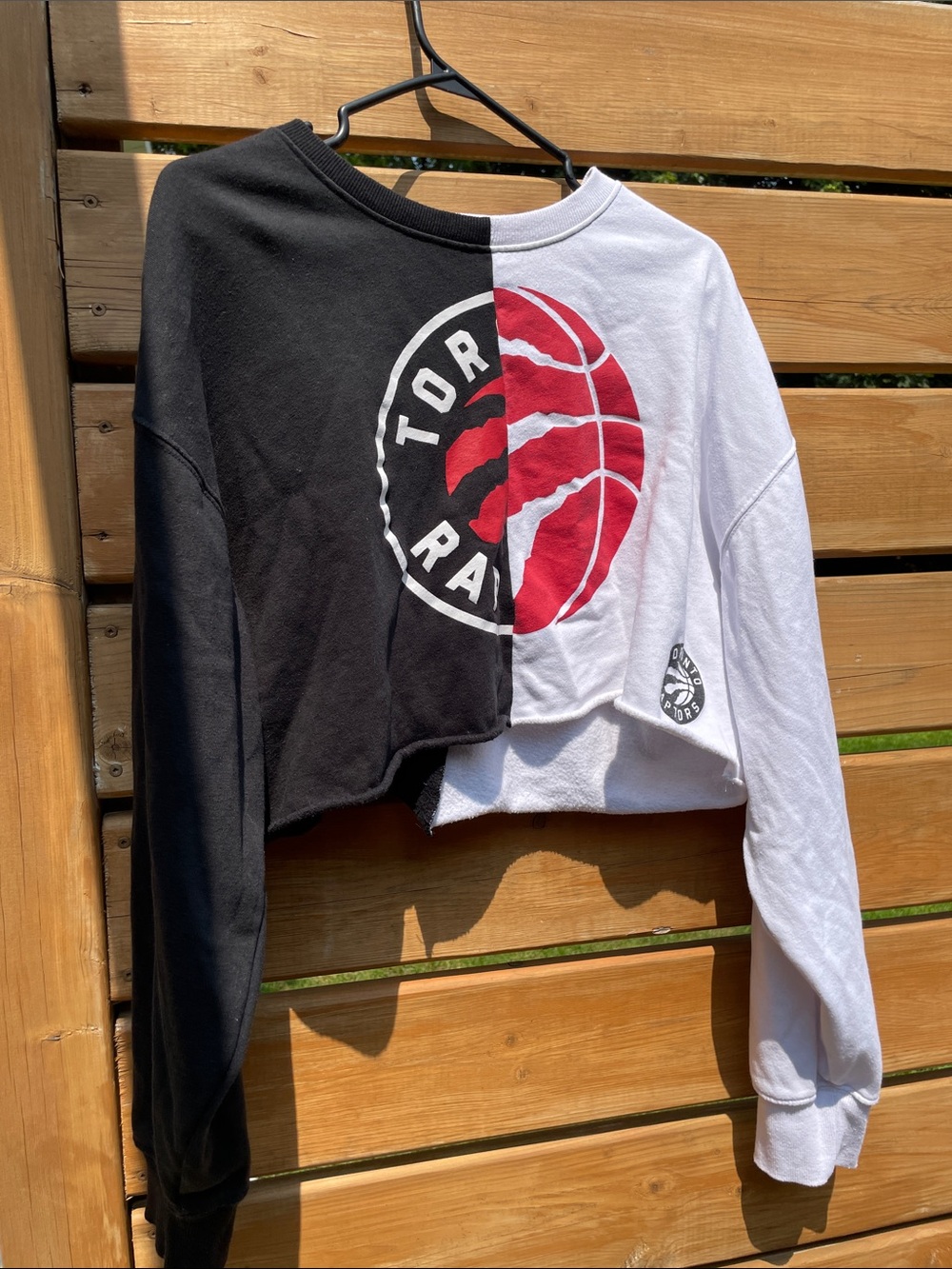 Split Black & White Cropped Crewneck Sweatshirt with Red Basketball Graphic